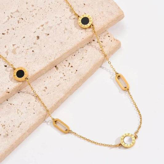 Elegante Kette mit runden Anhängern in Gelbgold