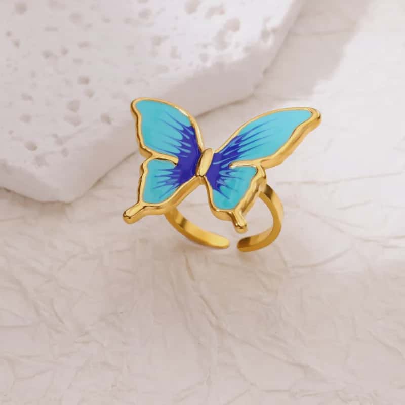 Hochwertiger Edelstahl Ring mit großem blauen Schmetterling in Gold. Eleganter Hingucker, langlebig, wasserfest und nickelfrei.