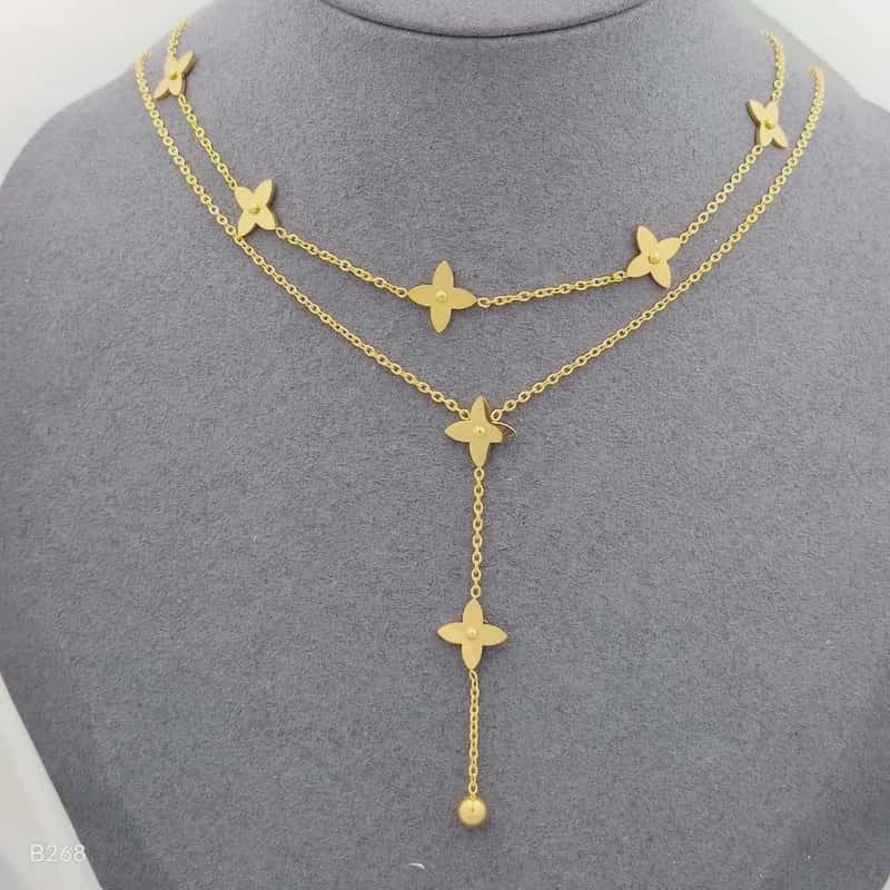 Hochwertige Edelstahl-Kette doppelreihig, edel, modern und mit goldenen Rauten. Stylisch und minimalistisch. Langlebig, wasserfest, hypoallergen und alltagstauglich.
