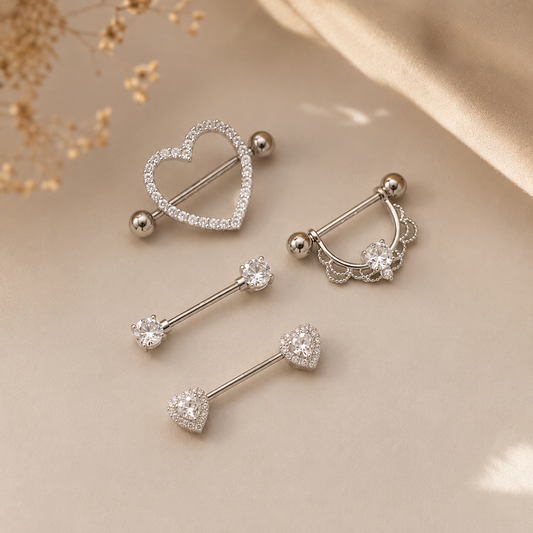Hochwertiges Edelstahl Brustwarzen-Piercing  mit funkelnden Zirkonia-Kugeln in modernen Design. Langlebig, nickelfrei, glanzbeständig und wasserfest.