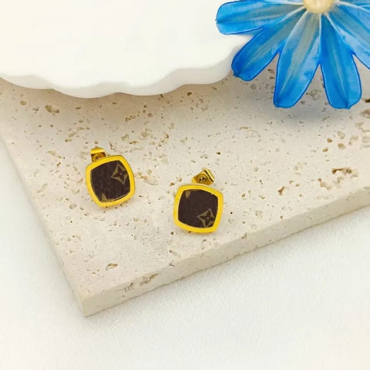 Hochwertige Edelstahl Ohrstecker in (Gold-Braun). Eleganter und minimalistischer Allrounder. Wasserfest, nickelfrei, glanzbeständig & Alltagstauglich.